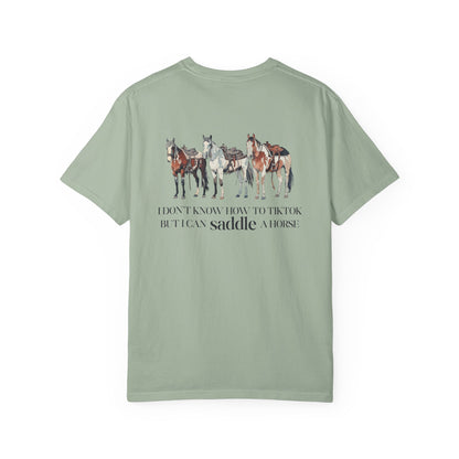 Circle R Arena “I Don’t Know How to TikTok But I Can Saddle a Horse” Graphic Tee – Western Rider T-Shirt with Logo Pocket Design