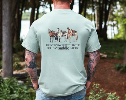 Circle R Arena “I Don’t Know How to TikTok But I Can Saddle a Horse” Graphic Tee – Western Rider T-Shirt with Logo Pocket Design